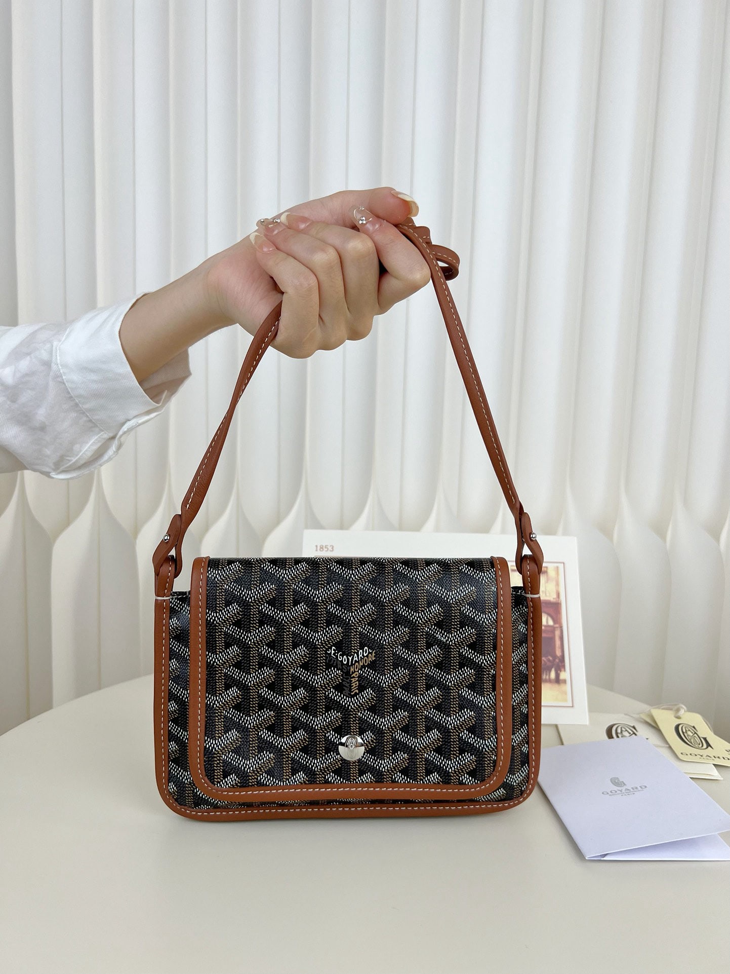 Goyard plumet: The Goyard plumet envelope bag is a lightweight pouch you can easily sling over your shoulder and head out. Despite its slim design with three compartments, it easily holds everyday essentials like yo
