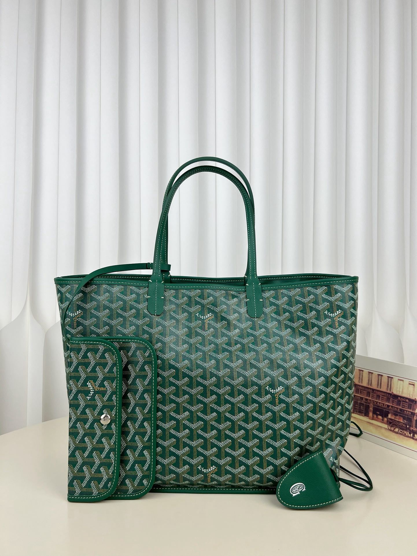 Goyard Anjou tote: The Goyard Anjou tote, a large reversible tote made of custom designed calfskin with a Goyardine cotton linen finish, is highly recommended. It's an upgraded version of the Stlouis (shopping bag), fea