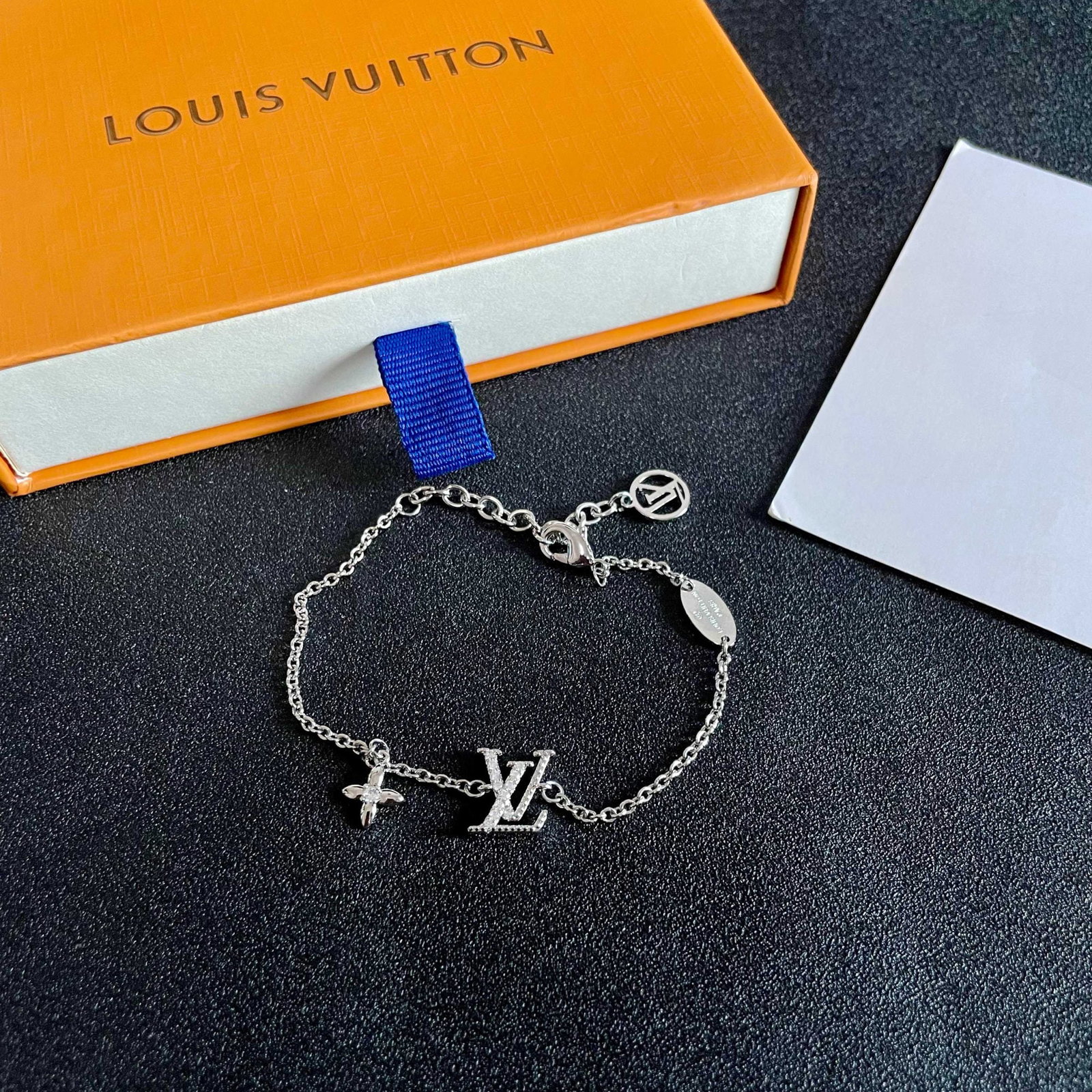 LV: This Louis Vuitton LV (using classic LV graphic design) bracelet is beautiful and incredibly versatile; it goes with everything. We offer FREE SHIPPING for both domestic and international clients.We a