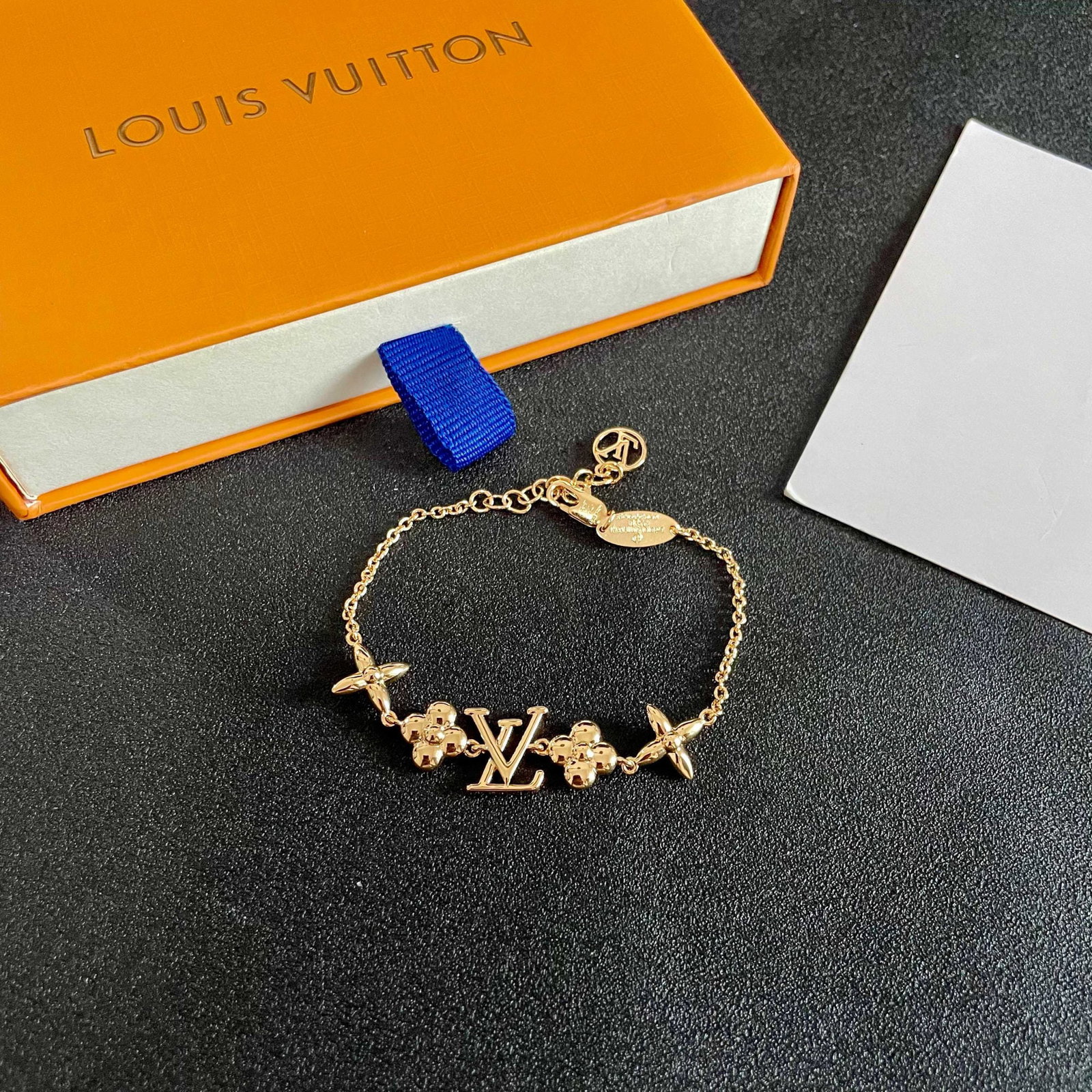 LV: The Louis Vuitton LV (using the classic LV graphic concept) bracelet is beautiful and very versatile; it goes with everything. We offer FREE SHIPPING for both domestic and international clients.We acc