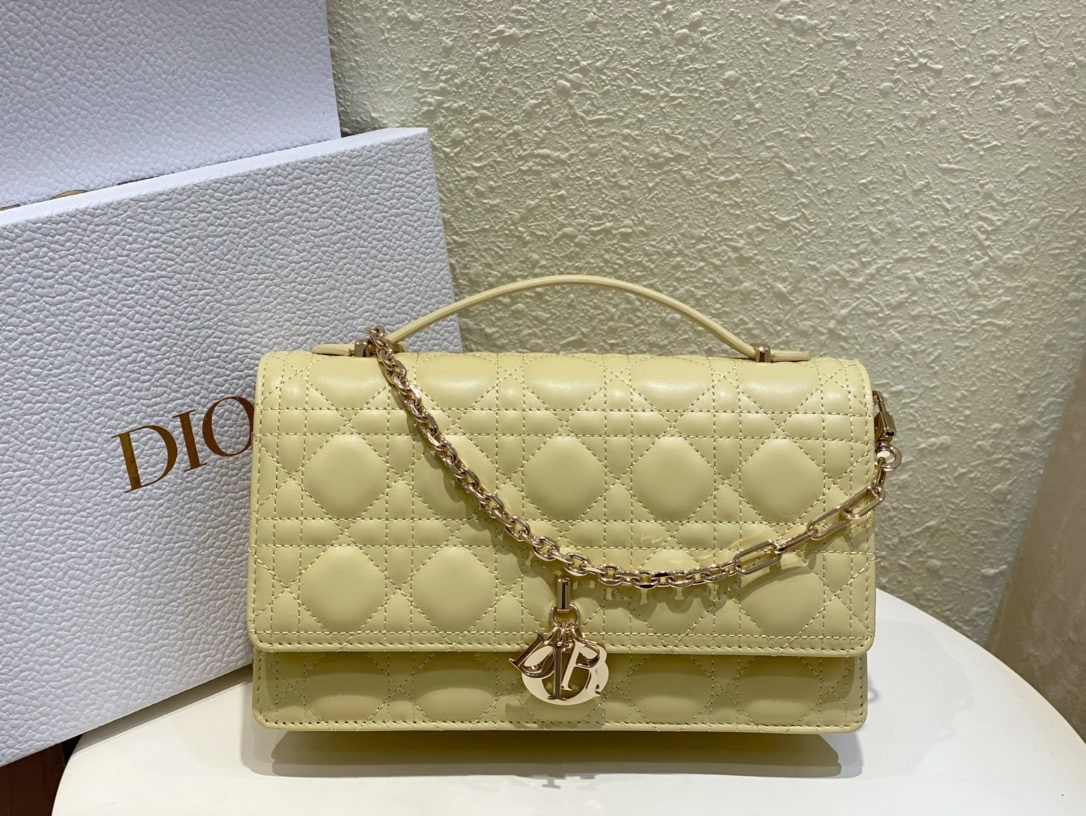 Christian Dior MISS DIOR: MISS DIOR Handbag (Yellow Lambskin Leather with Cannage) The Miss Dior handbag is from the 2024 Early Spring collection, elegant and practical. Crafted from lambskin leather with cannage stitching, it