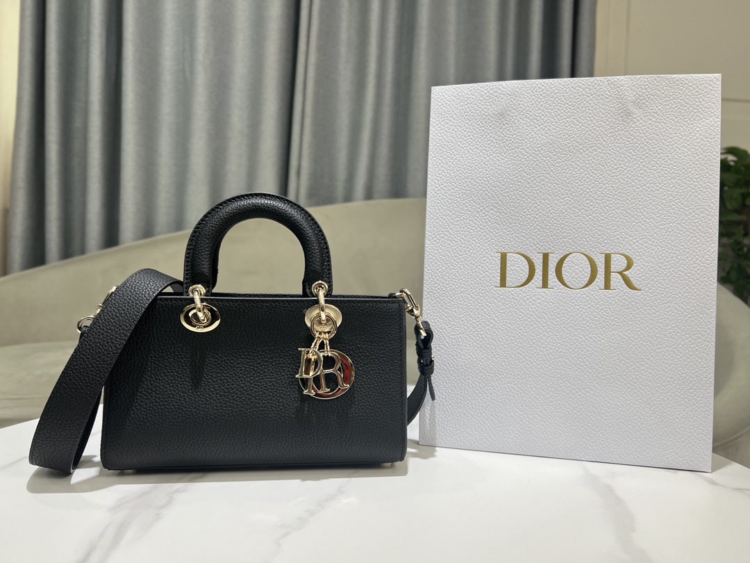Christian Dior Lady D Sire My ABCDior: The small Lady D Sire My ABCDior handbag, made of black calfskin leather, is part of the Spring/Summer 2024 ready to wear collection. Inspired by the classic elegance of the Lady Dior handbag, it's re