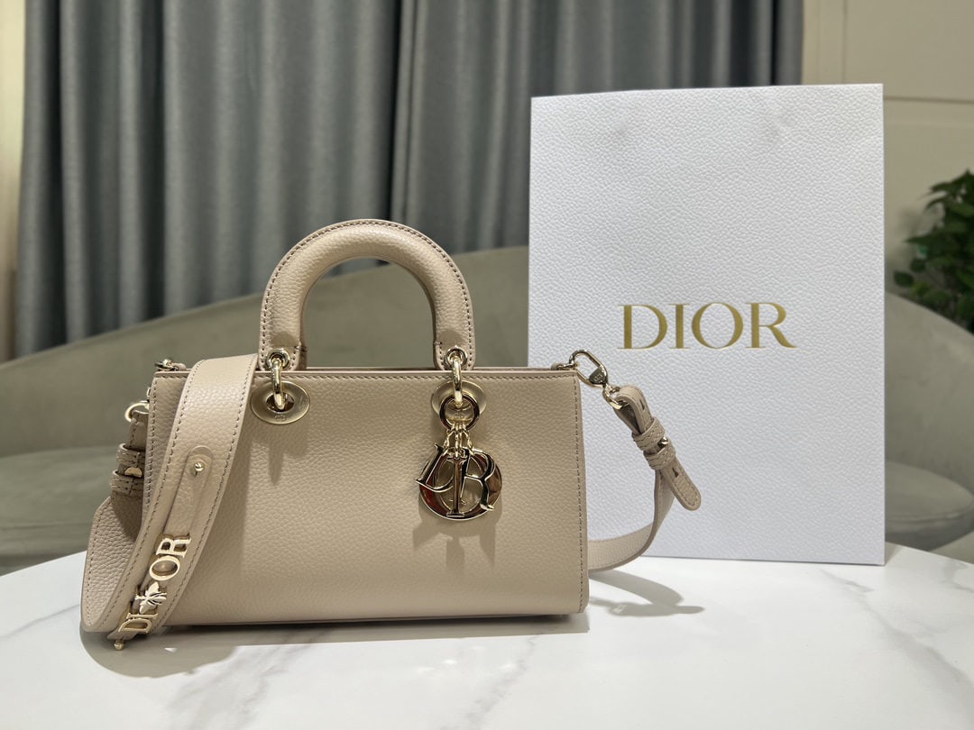 Christian Dior Lady D Sire My ABCDior: The small Lady D Sire My ABCDior handbag, made of blush beige calfskin leather (model number: M1150OTRL_M51U), is from the Spring/Summer 2024 ready to wear collection. Inspired by the classic elegance