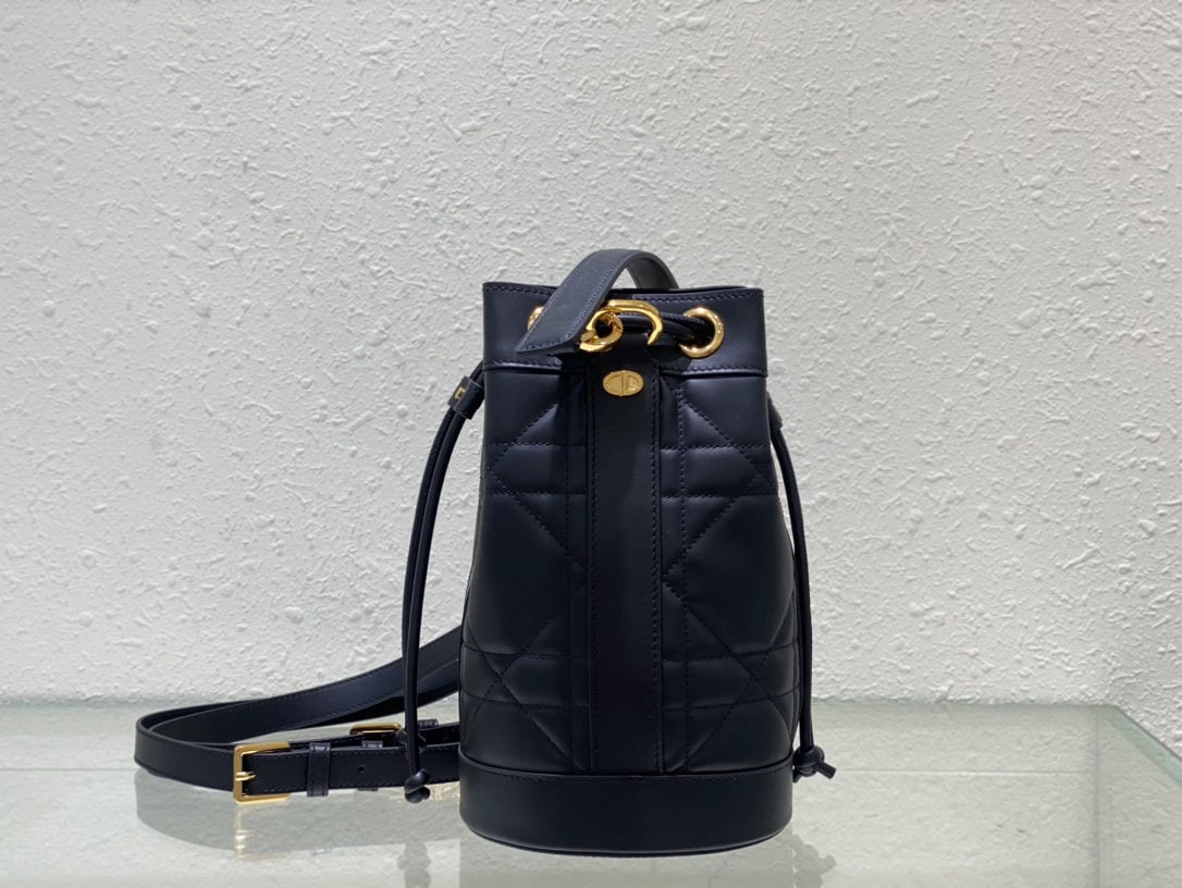 Christian Dior: The Dior backpack made its stunning debut at the Dior Spring/Summer 2024 ready to wear collection, redefining Dior's classic modern elegance. Crafted from supple black calfskin leather, it features pr