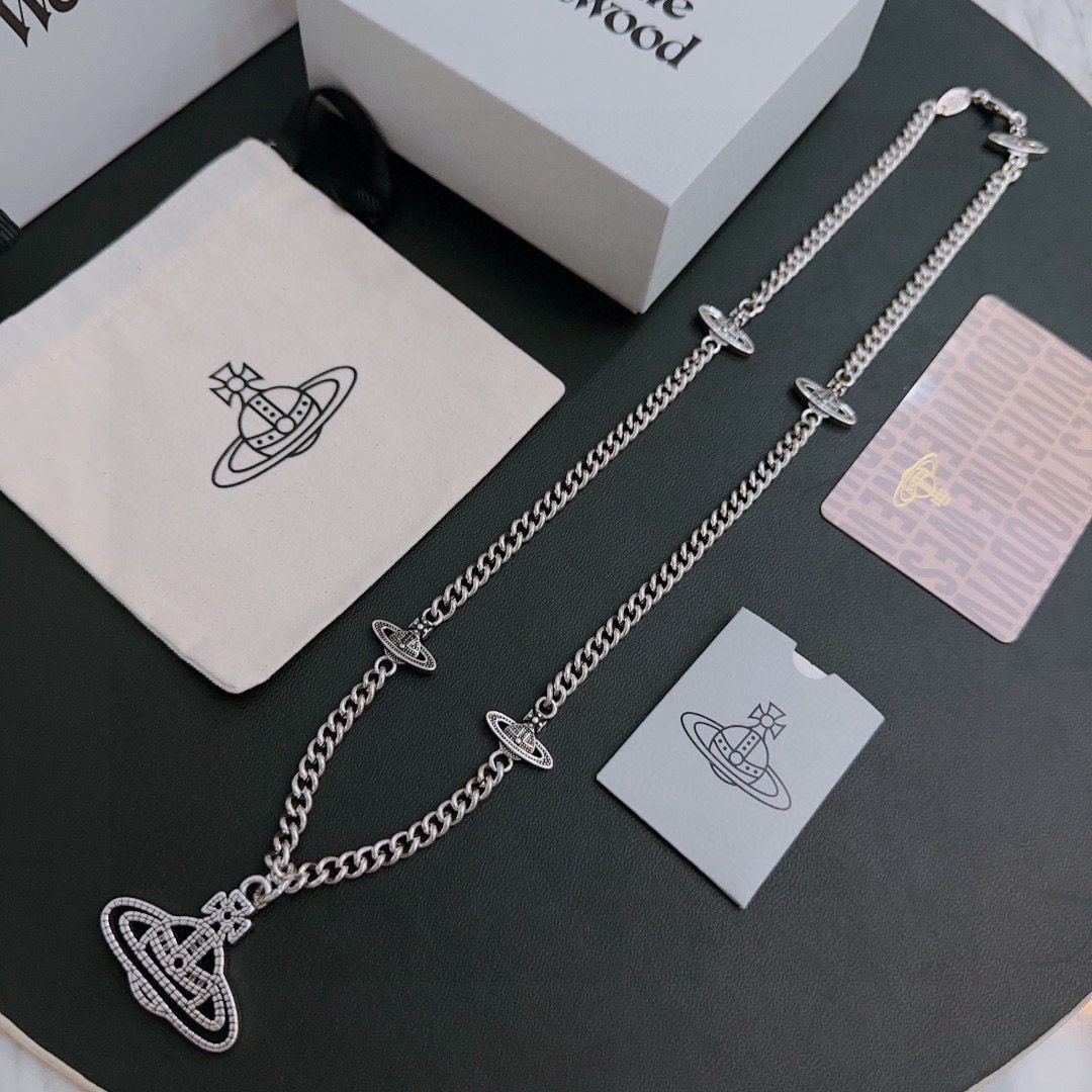Vivienne Westwood's classic Saturn Necklace: Vivienne Westwood classic Saturn necklace, unisex (60cm). A pearl necklace by Vivienne Westwood, the British fashion designer known as the "mother of punk" in fashion. High quality, beautifully design