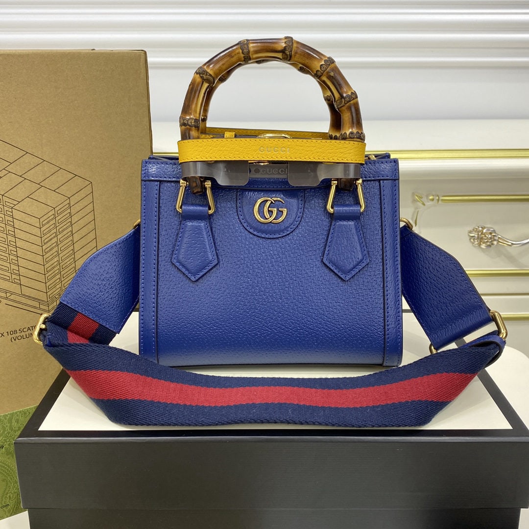 GUCCI Diana: The GUCCI Diana Bamboo Mini Tote Bag in royal blue combines two recognizable brand elements: the bamboo handle and the double G hardware. In this mini tote, the royal blue leather is complemented by t