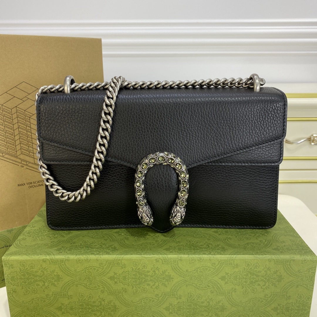 GUCCI Dionysus: The GUCCI Dionysus Medium Chain Shoulder Bag features a black Dionysus shoulder bag with a diamond encrusted buckle??a detail inspired by the Greek god Dionysus, who, in mythology, rode a tiger sent b