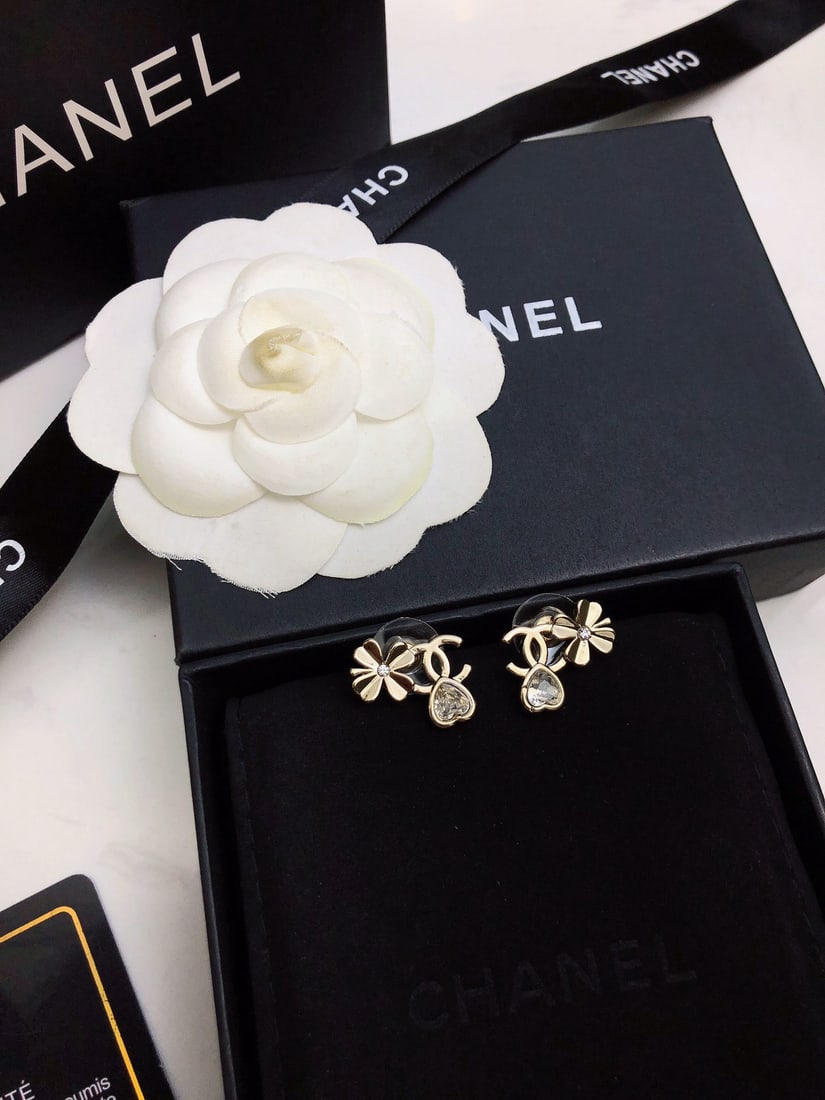 Chanel earrings: Chanel earrings are simple, elegant, and petite, perfect for summer wear. They're incredibly versatile, flattering, and make your face look slimmer. Grab a pair now and step onto the path of fashion t
