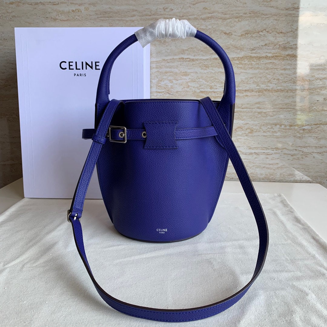 Celine: Electric blue pebbled leather BIG BAG BUCKET NANO soft grain calfskin bucket bag with one leather handle, adjustable and detachable shoulder strap, and one buckle to close the bag. 8 x 6 x 16 inches