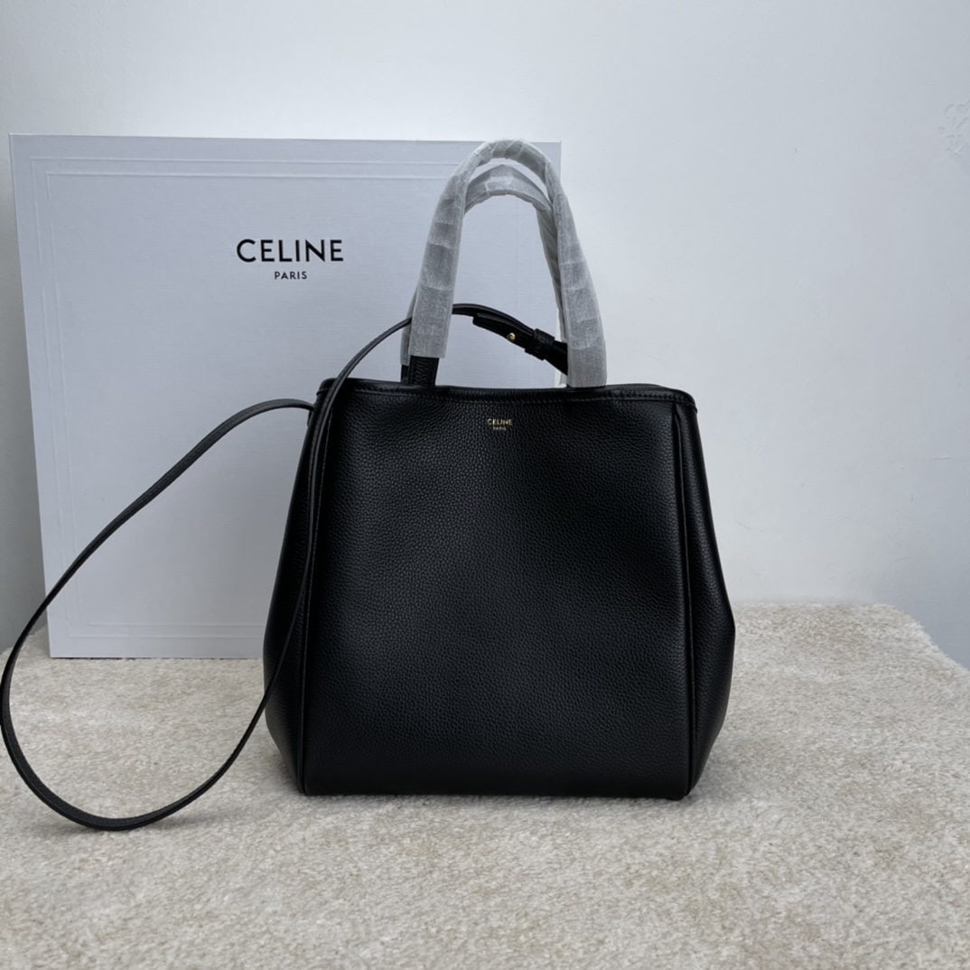 Celine: Black lychee patterned Cabbs transformable tote bag for autumn and winter, made of imported calfskin leather. Suitable for shoulder or crossbody wear. Size: 27 cm. We offer FREE SHIPPING for both dome