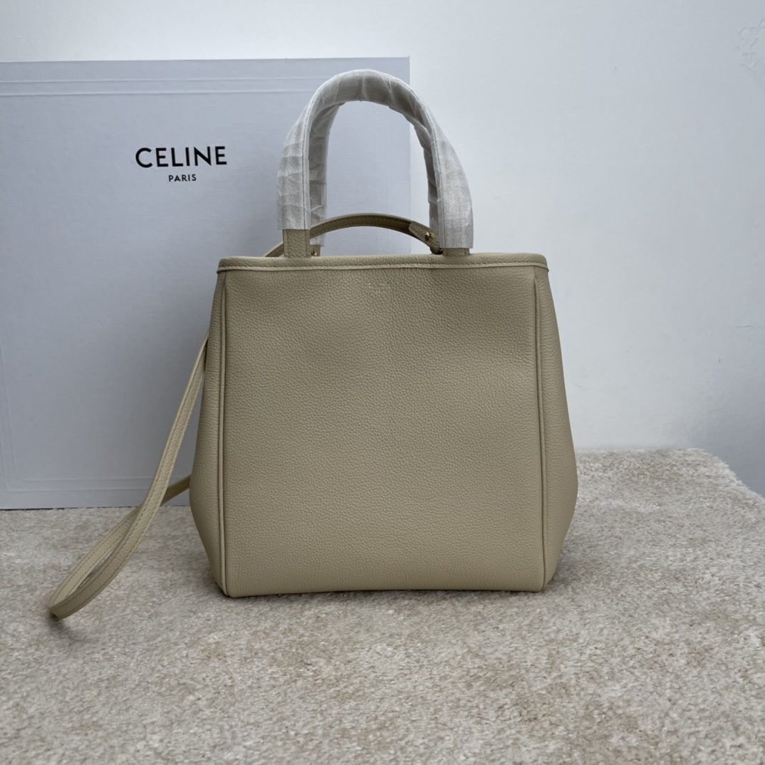 Celine: Oatmeal colored lychee patterned Cabbs transformable tote bag for autumn and winter, made of imported calfskin leather. Suitable for shoulder or crossbody wear. Size: 27 cm. We offer FREE SHIPPING