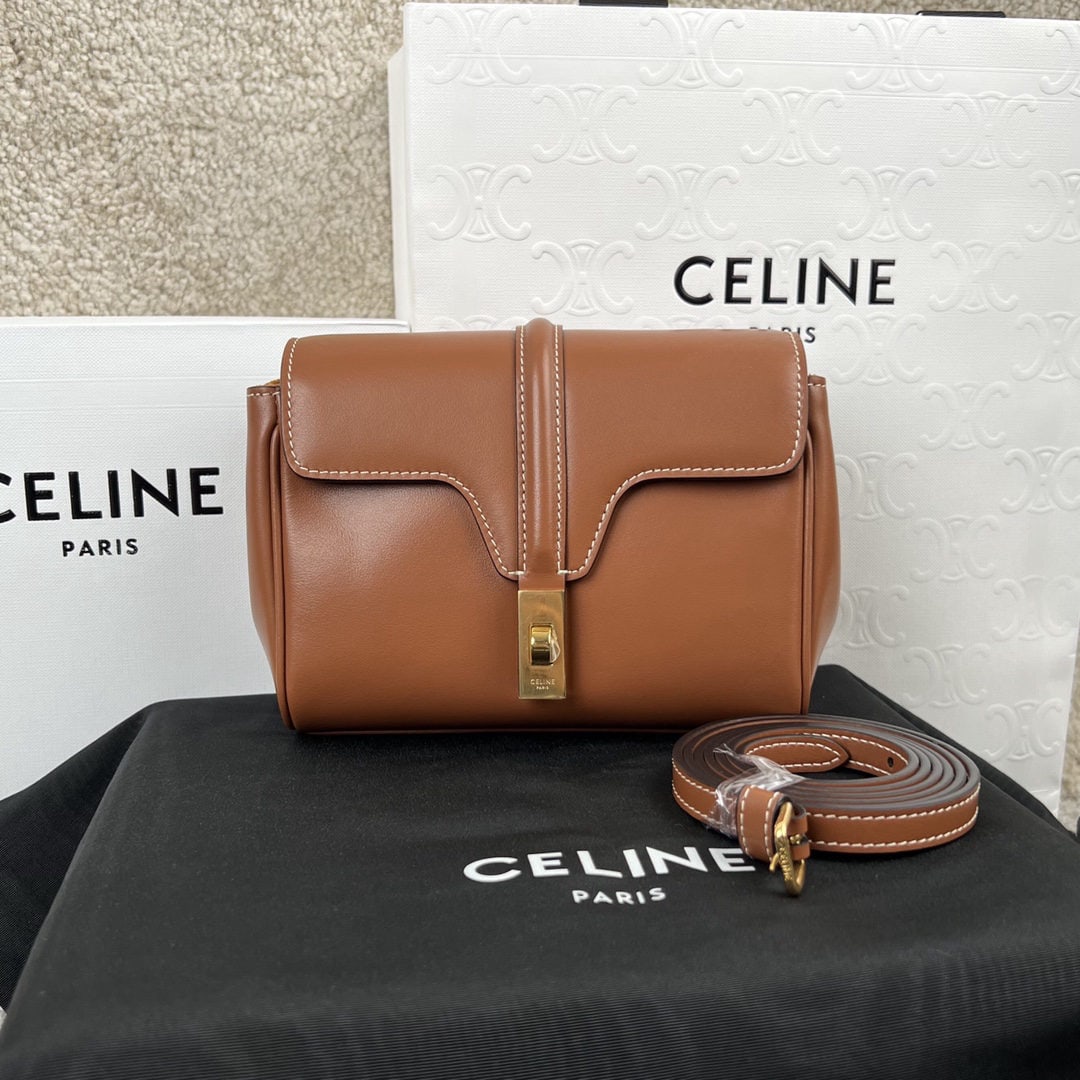Celine: SOFT 16 Mini Smooth Calfskin Handbag, measuring 18x12.5x6 cm. This model can accommodate larger smartphones such as the PLUS. It can be worn crossbody or over the shoulder, features a turn lock closur