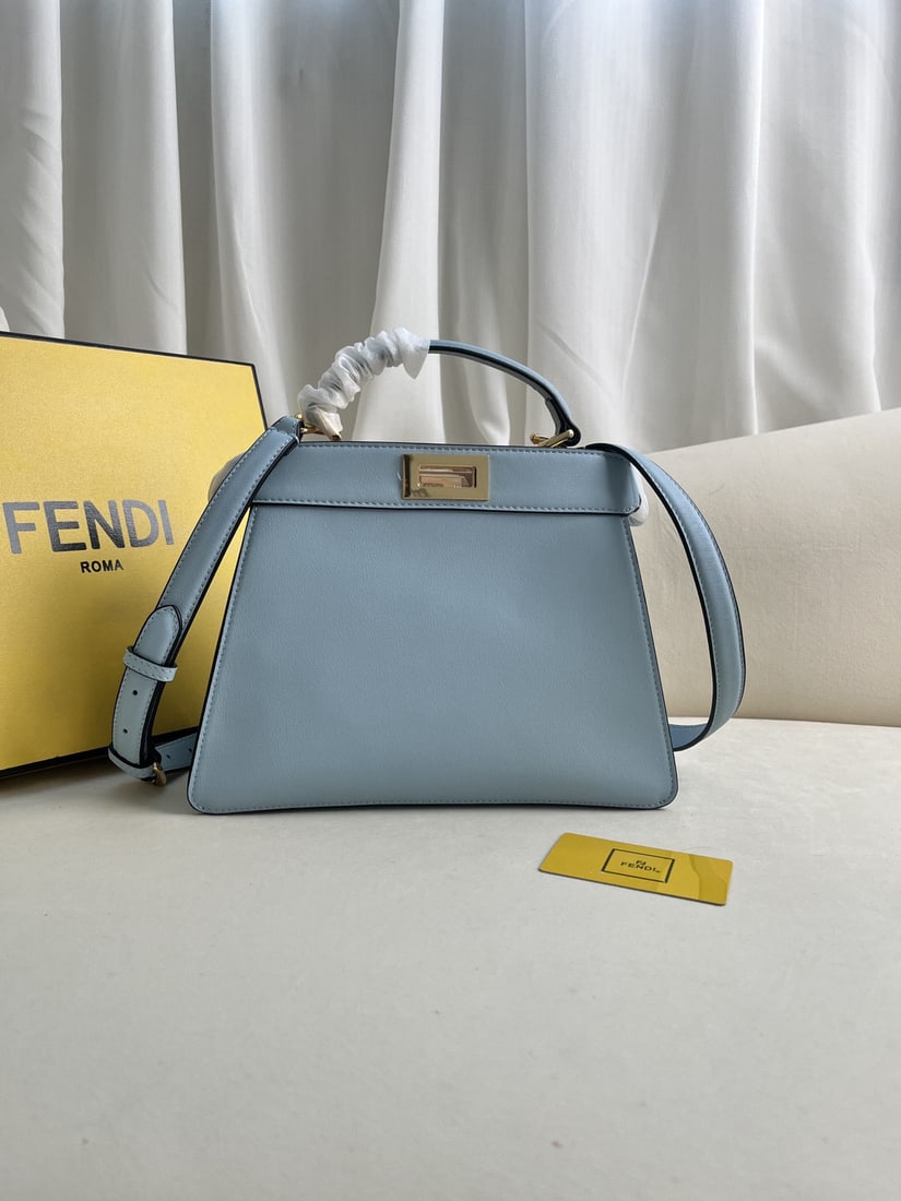 Fendi Peekaboo ISeeU: The Iconic Peekaboo ISeeU medium sized leather handbag is made of brown leather and features classic twist locks on both sides. It has a soft Nappa leather lining, two compartments separated by a rigi