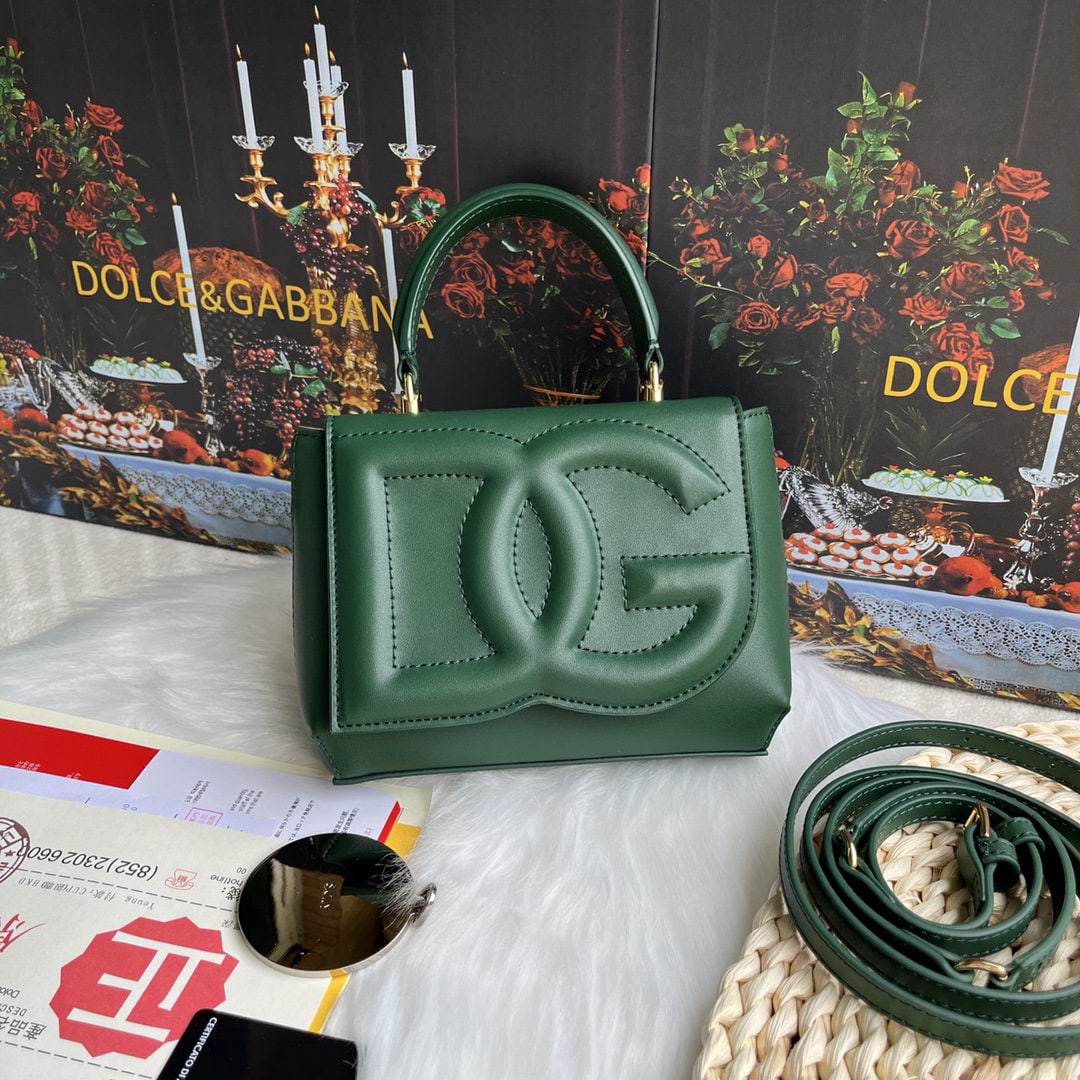 Dolce & Gabbana: Dolce & Gabbana's exquisite handcrafted leather bag features a calfskin body with hand painted edges for a structured look. The quilted DG logo adds a touch of modern style, making it a favorite among