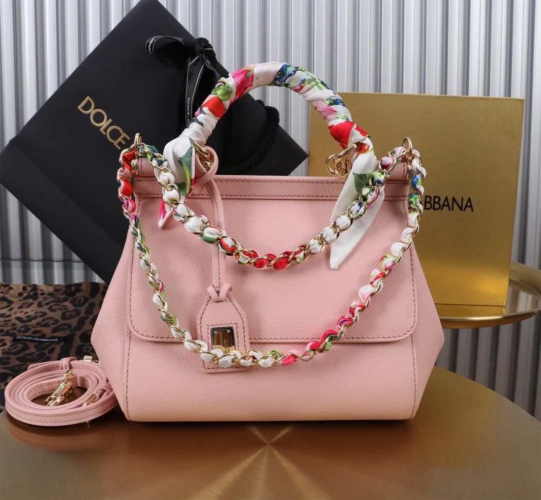 Dolce & Gabbana Sicily: The iconic Dolce & Gabbana Sicily collection is now presented in a compact version, offering easy storage for frequently used items. Its unique design features a hidden magnetic closure on the front f