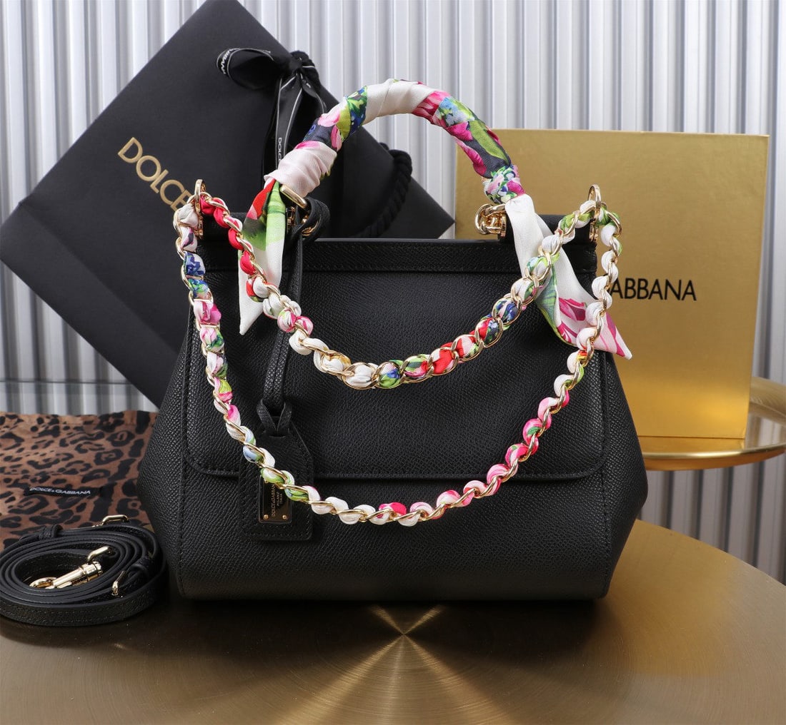 Dolce & Gabbana Sicily: The iconic Dolce & Gabbana Sicily collection is now presented in a compact version, offering easy storage for frequently used items. Its unique design features a hidden magnetic closure on the front f