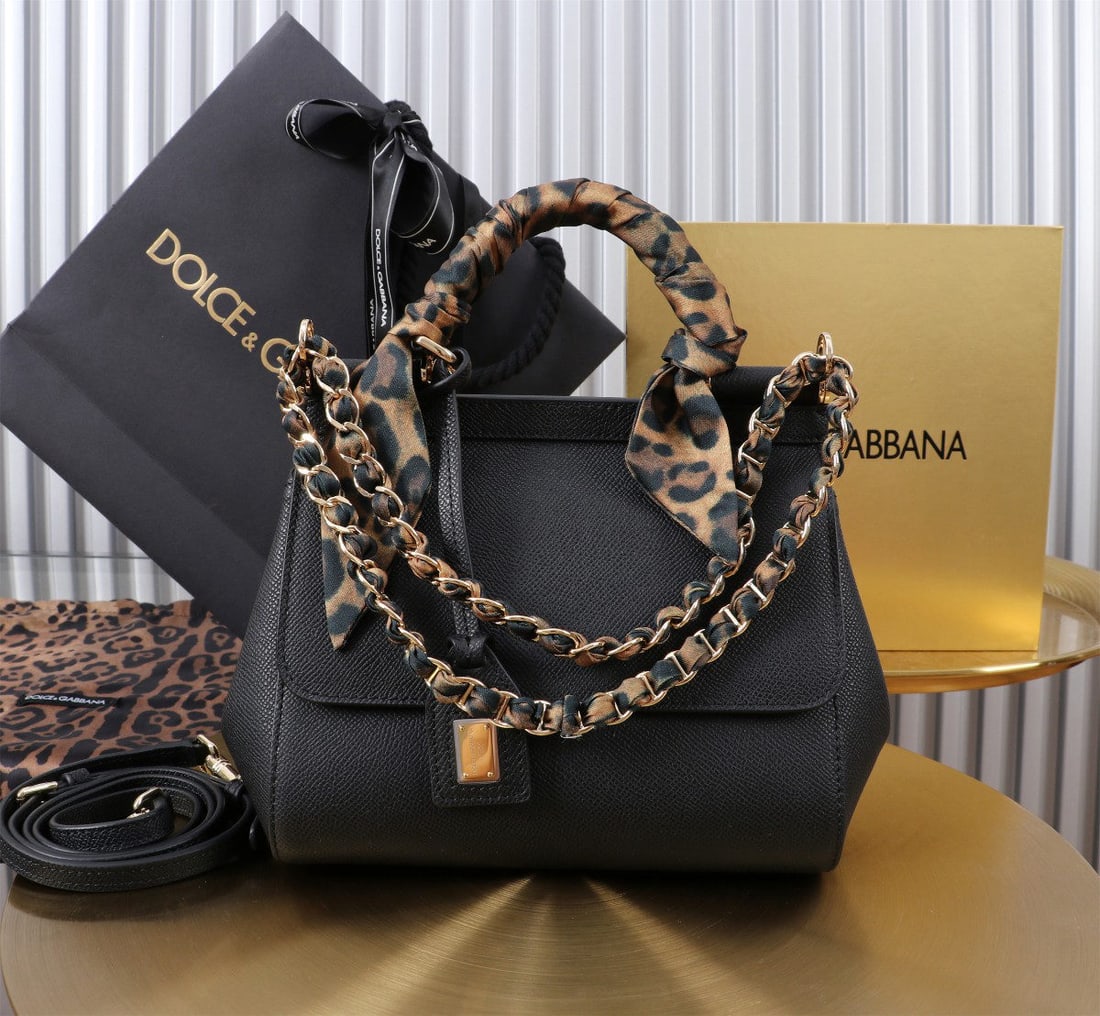 Dolce & Gabbana Sicily: The iconic Dolce & Gabbana Sicily collection is now presented in a compact version, offering easy storage for frequently used items. Its unique design features a hidden magnetic closure on the front f