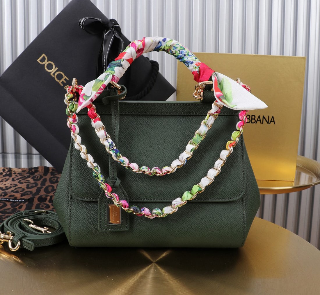 Dolce & Gabbana Sicily: The iconic Dolce & Gabbana Sicily collection is now presented in a compact version, offering easy storage for frequently used items. Its unique design features a hidden magnetic closure on the front f