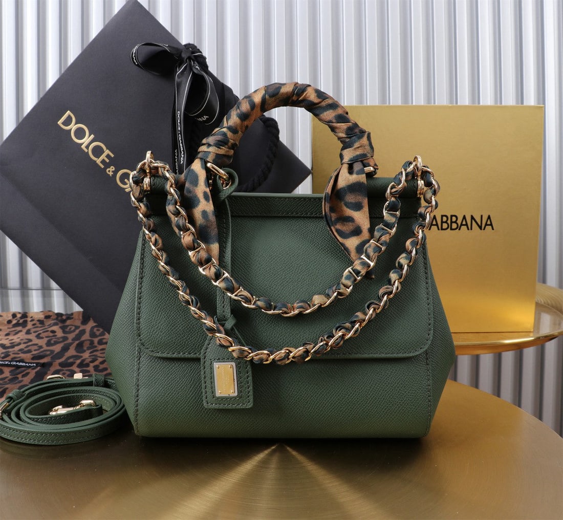 Dolce & Gabbana Sicily: The iconic Dolce & Gabbana Sicily collection is now presented in a compact version, offering easy storage for frequently used items. Its unique design features a hidden magnetic closure on the front f