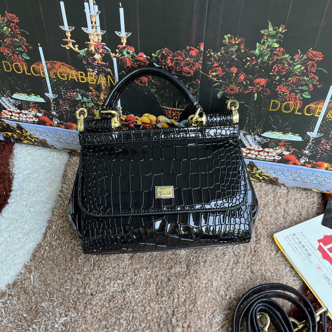 Dolce & Gabbana: Dolce & Gabbana crocodile embossed bag. Exquisite craftsmanship. Perfectly embossed top grain cowhide leather, 20X17X7cm. Can be worn crossbody. Very practical; easily fits a long wallet, cosmetic bag