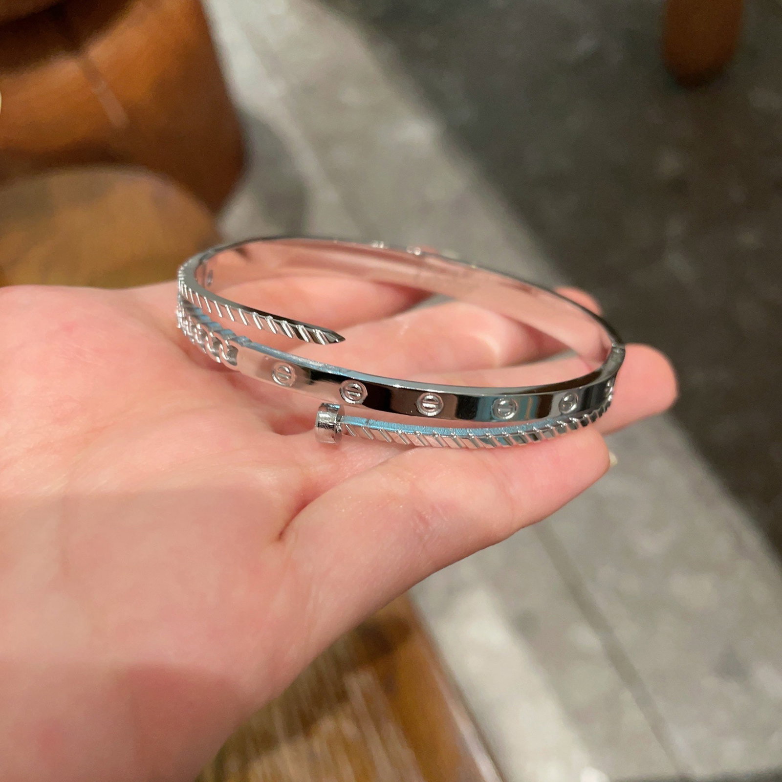 Cartier Nail Bracelet: The new narrow design of the Cartier Nail bracelet is even more exquisite. You absolutely must own this beautiful piece; it's incredibly flattering and makes your skin look brighter. We offer FREE SHI