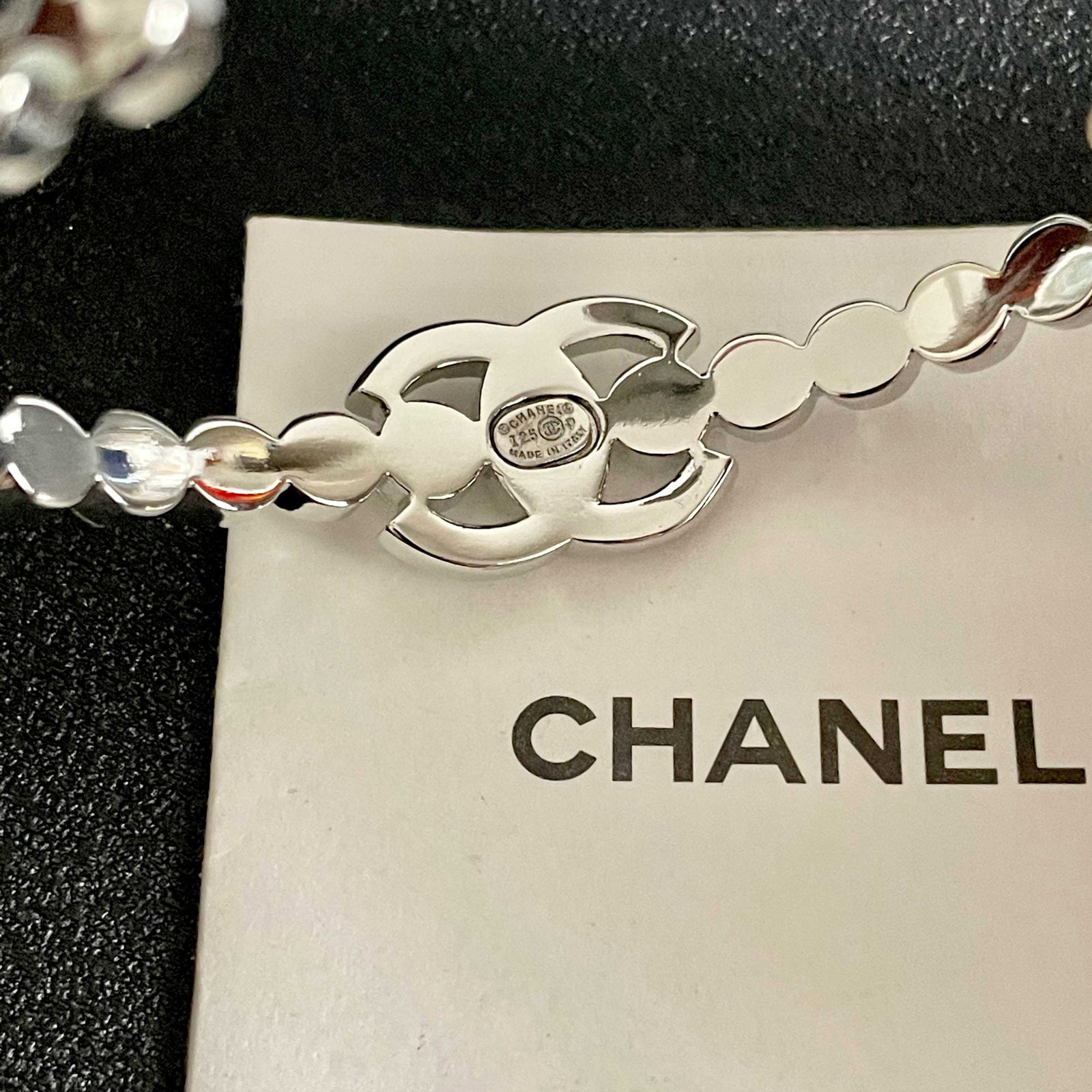 CHANEL double C letter bracelet: The CHANEL double C logo bracelet has a beautifully matched color scheme, exuding a sophisticated and goddess like aura. It's a high end, classic, and incredibly charming piece with excellent value fo