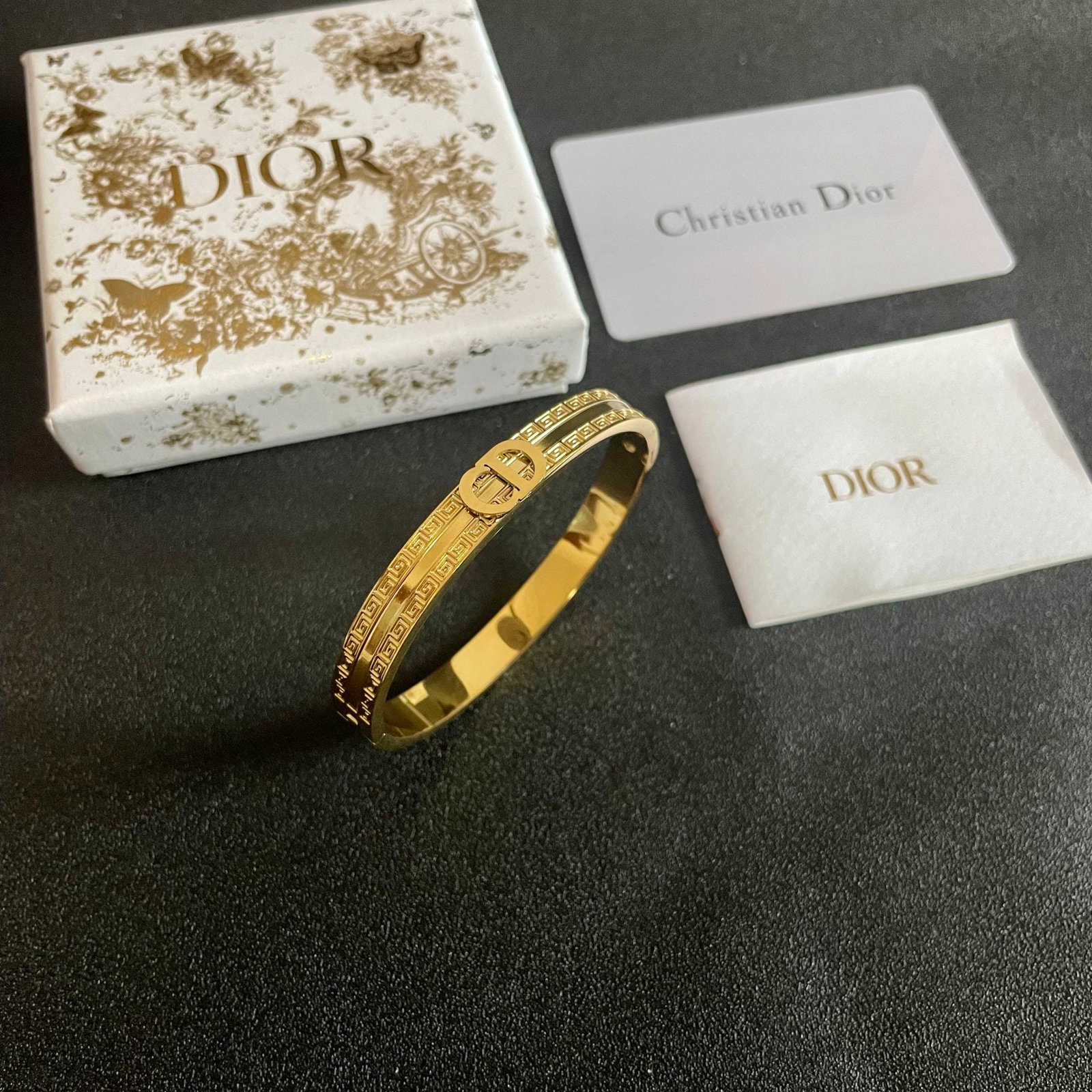 Dior bracelet: The Dior bracelet is simple yet elegant, with a white gold color that makes your skin look incredibly flattering. It can be layered with your other bracelets for a stunning look. We offer FREE SHIPPIN