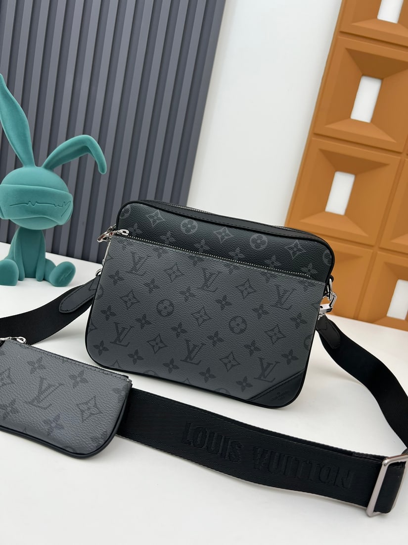 Trio Messenger Bag: The Trio messenger bag is made of Monogram Eclipse canvas and Monogram Eclipse Reverse canvas. In addition to its traditional crossbody bag functionality, it features a detachable zip pocket and a coi
