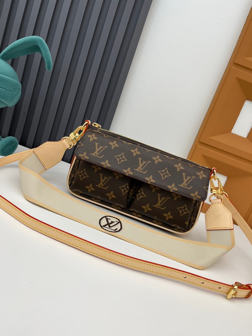 Vibe VivaXcite handbag: The Vibe VivaXcite handbag from the Double Shoulder Strap series is inspired by the House VivaXcite bag from 2003, made of Monogram canvas. With multiple pockets both inside and out, it's the perfect