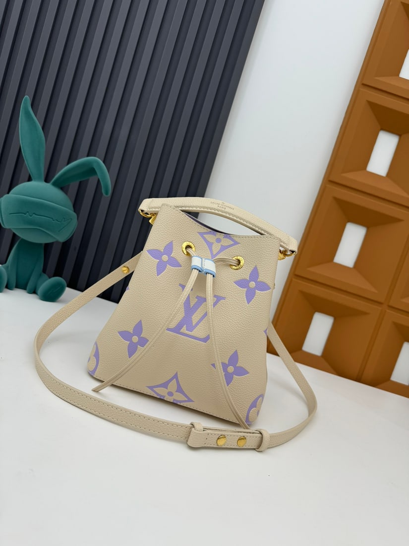 NeoNoe BB handbag: This NeoNoe BB handbag is made of Monogram Empreinte calfskin leather embossed with the LV logo and Monogram flowers. 20.0 x 20.0 x 13.0 cm (Length x Height x Width) We offer FREE SHIPPING for both do
