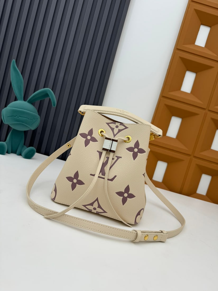 NeoNoe BB handbag: This NeoNoe BB handbag is made of Monogram Empreinte calfskin leather embossed with the LV logo and Monogram flowers. 20.0 x 20.0 x 13.0 cm (Length x Height x Width) We offer FREE SHIPPING for both do