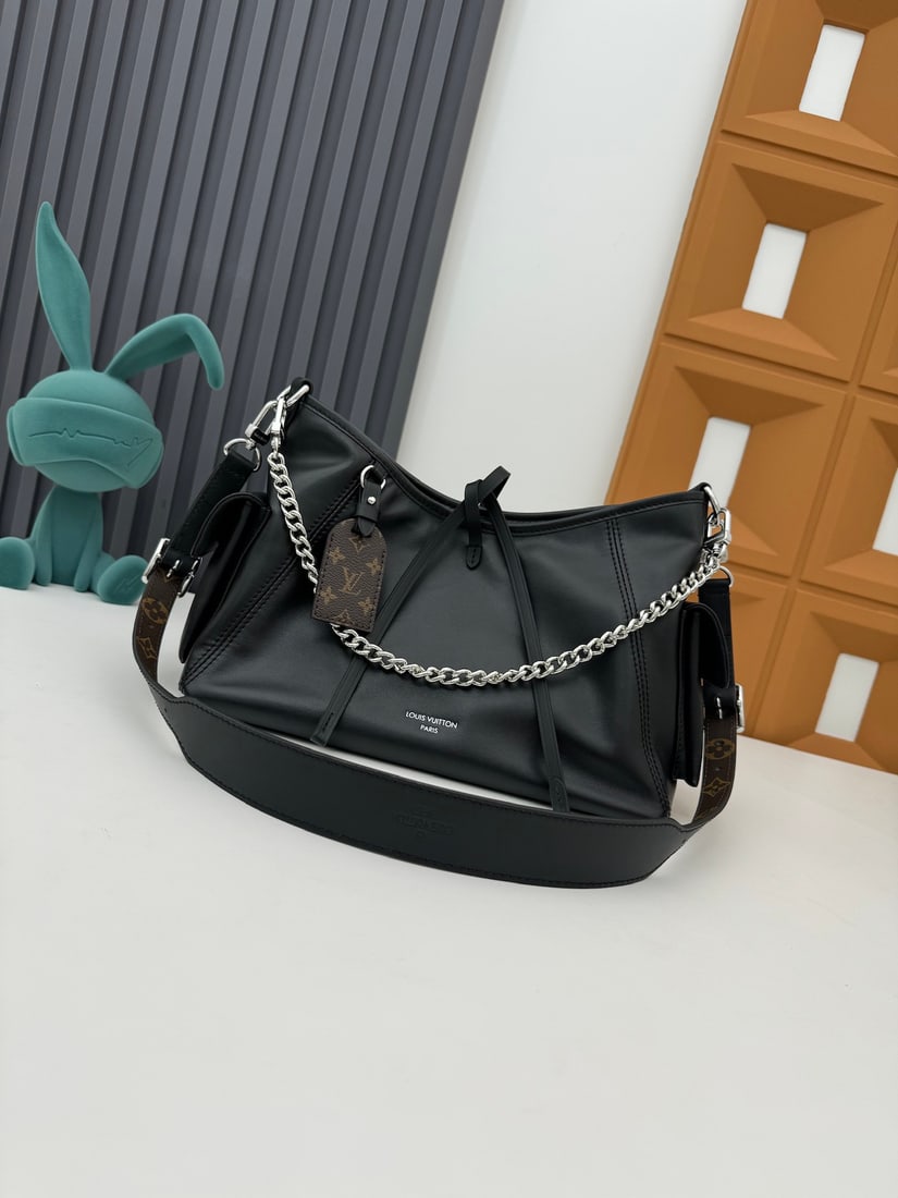 CarryAll Cargo Small Handbag: This CarryAll Cargo small handbag features two side pockets. The detachable shoulder strap and chain strap offer versatile styling options. Dimensions: 33.5 x 23 x 15 cm (Length x Height x Width). We