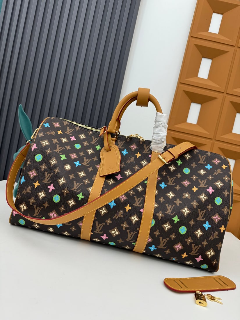 LVXYK Keepall 50: This LVXYK Keepall 50 combines classic design with iconic details. Crafted from Damier Graphite canvas, it's a carry on size. It features rounded leather handles and an adjustable, detachable