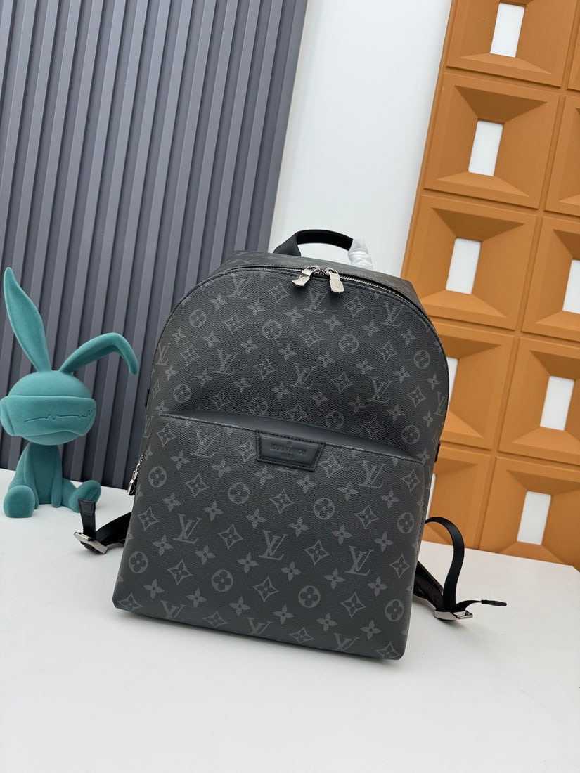 Apollo Backpack: This Apollo backpack is crafted from supple Monogram Eclipse coated canvas, a perfect blend of style and function. Features include extremely comfortable leather shoulder straps and a front pocket
