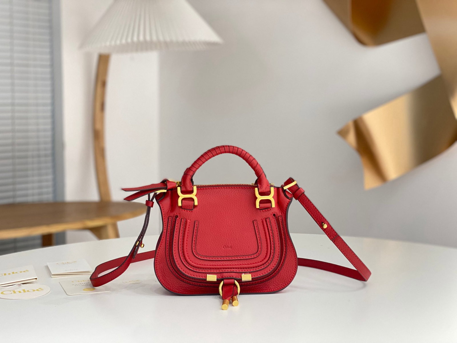 Chloe x Marcie: This Chloe x Marcie bright red classic bag is incredibly practical and spacious, perfect for working women. It can easily hold a laptop, documents, iPad, daily makeup and cosmetics, a small umbrella,