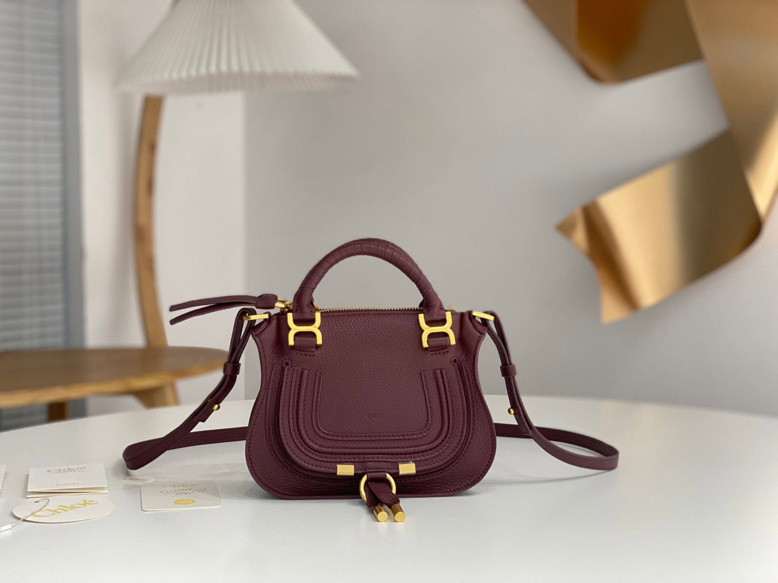 Chloe x Marcie: The Chloe x Marcie burgundy classic and trendy bag is incredibly practical with ample capacity. Perfect for working women, it can easily hold a laptop, documents, iPad, daily makeup and cosmetics, a
