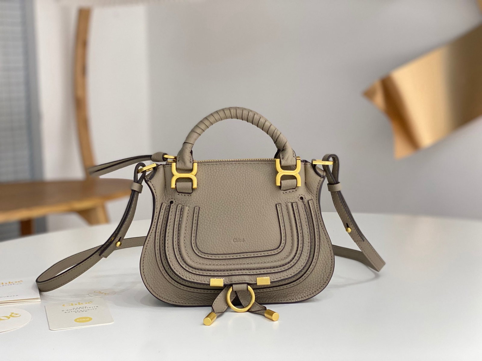 Chloe x Marcie: The Chloe x Marcie grey and white classic style bag is very practical and spacious, perfect for working women. It can easily hold a laptop, documents, iPad, daily makeup and cosmetics, a small