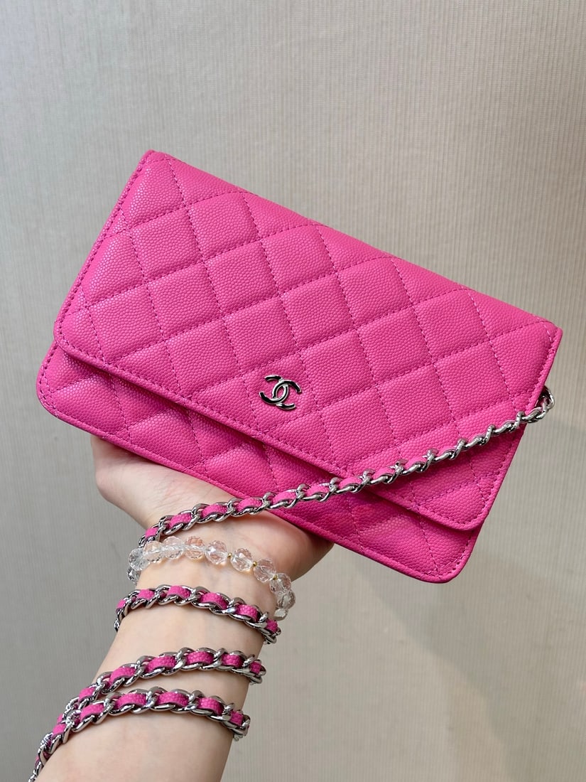 CHANEL: The softest caviar skinned crust ever! A close inspection reveals numerous fine, delicate raised particles on the surface. The sheen is just right, resulting in an exceptionally high end feel. It's