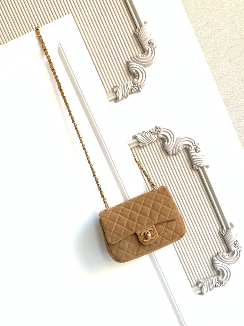 CHANEL Blue Suede CF Bag: Blue suede CF bag, classic quilted pattern with light gold hardware, vintage yet sophisticated! The suede is soft and delicate, perfect for autumn and winter. The chain strap design allows for shoulde
