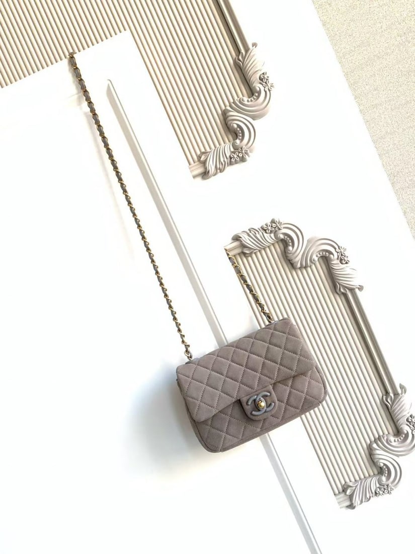 CHANEL Blue Suede CF Bag: Blue suede CF bag, classic quilted pattern with light gold hardware, vintage yet sophisticated! The suede is soft and delicate, perfect for autumn and winter. The chain strap design allows for shoulde