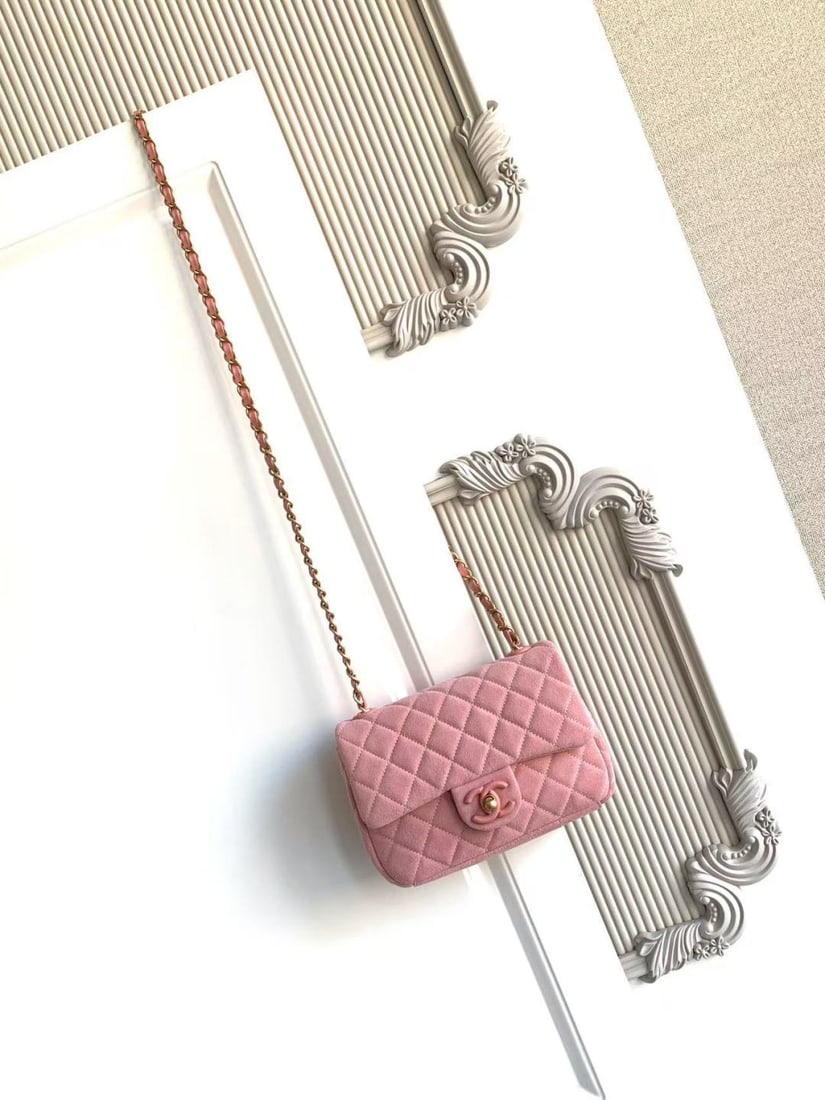 CHANEL Blue Suede CF Bag: Blue suede CF bag, classic quilted pattern with light gold hardware, vintage yet sophisticated! The suede is soft and delicate, perfect for autumn and winter. The chain strap design allows for shoulde