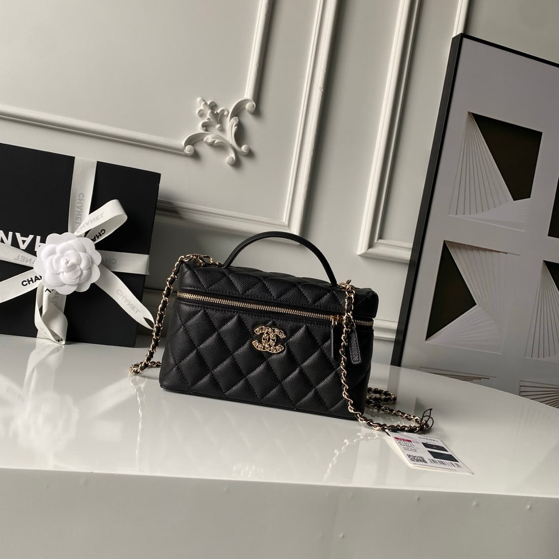 CHANEL chain clutch: CHANEL Spring New Arrival: Exquisite Petite Chain Clutch in calfskin with a detachable gold tone metal chain. It also offers a good balance of size and features a unique design. Dimensions: 17 x 19.5 