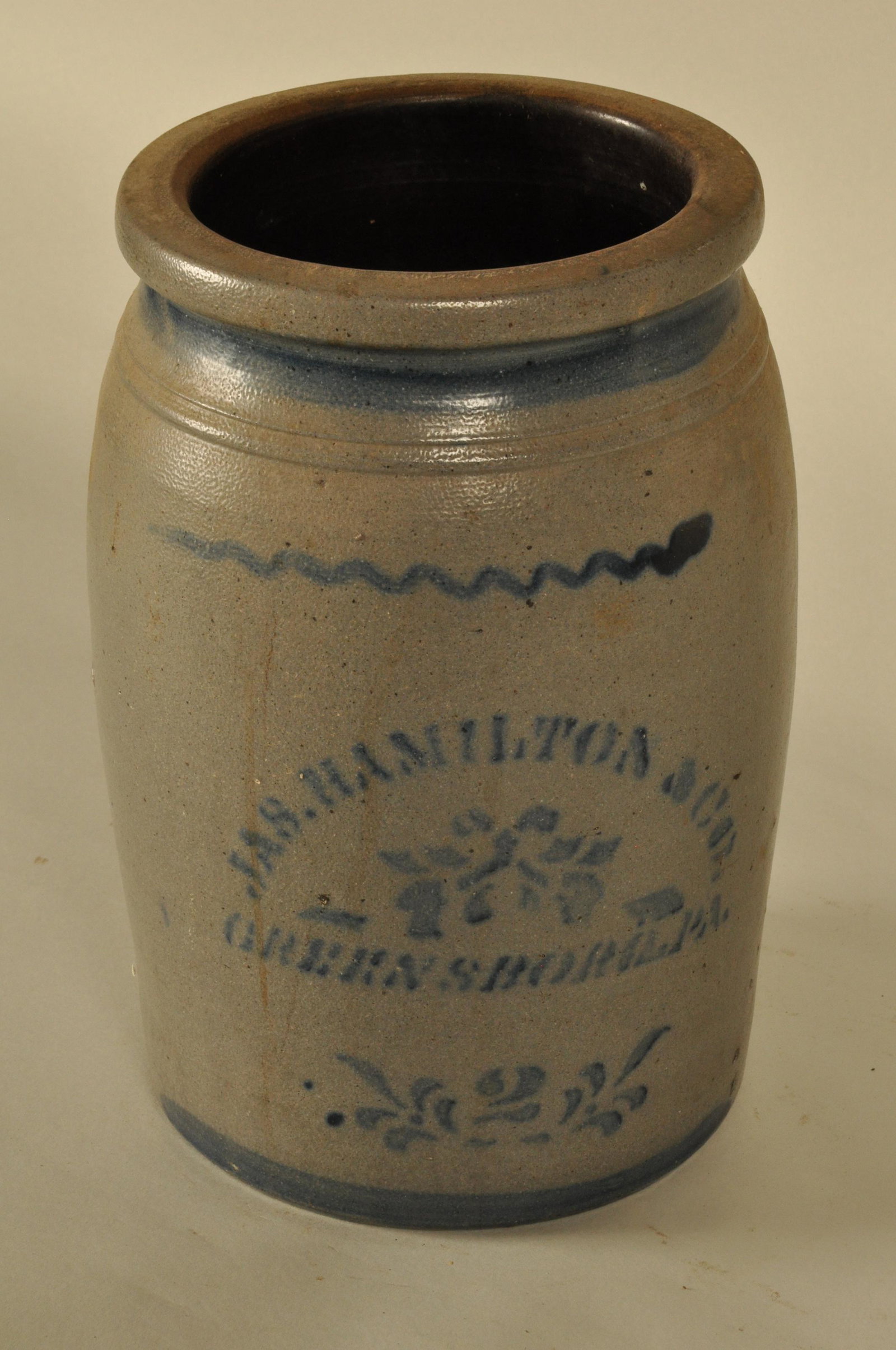 Blue Decorated Stoneware Jar: Cobalt stencil "JAS. Hamilton & Co. Greensboro, PA" 12 in. H x 7.5 in. dia.