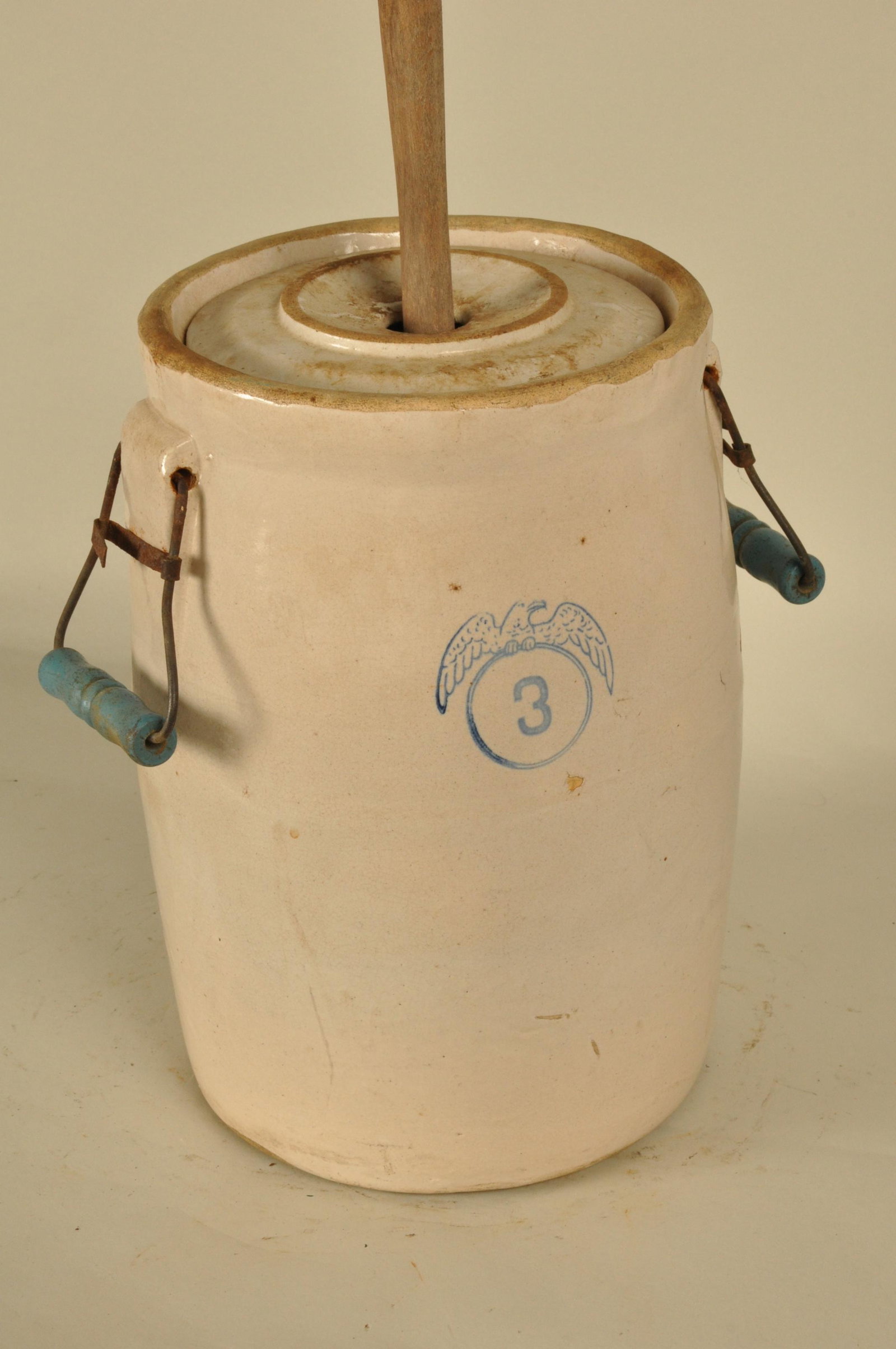 Blue Decorated Stoneware Churn: Blue eagle and #3. Wood bail handles 15 in. H