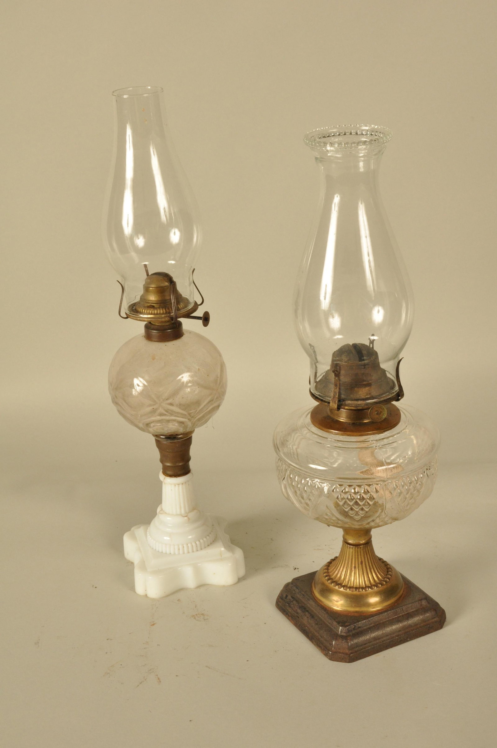 Lot of 2 Oil lamps: 2 Iron & Milk glass base Oil lamps 17" H