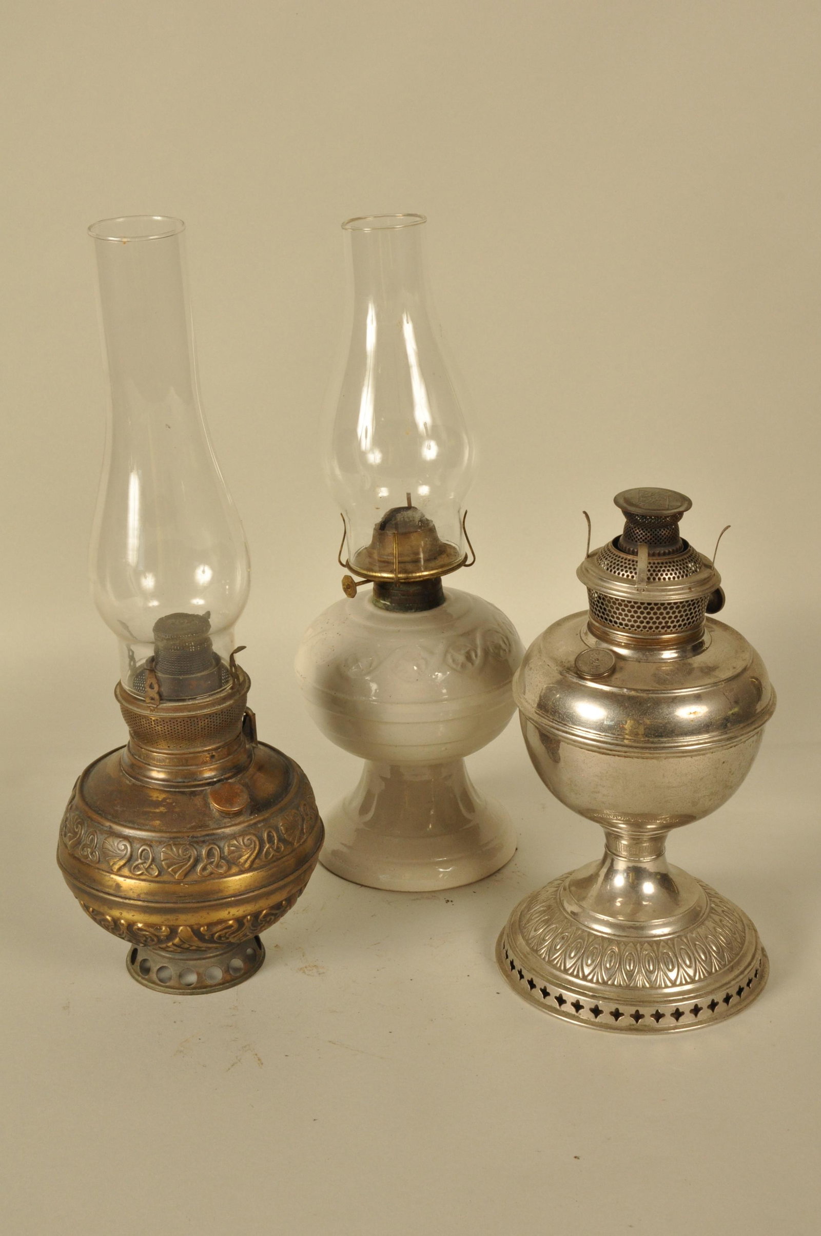 Lot of 3 Oil lamps: 3: B&H/ embossed brass/ porcelein Oil lamps 18" H:
