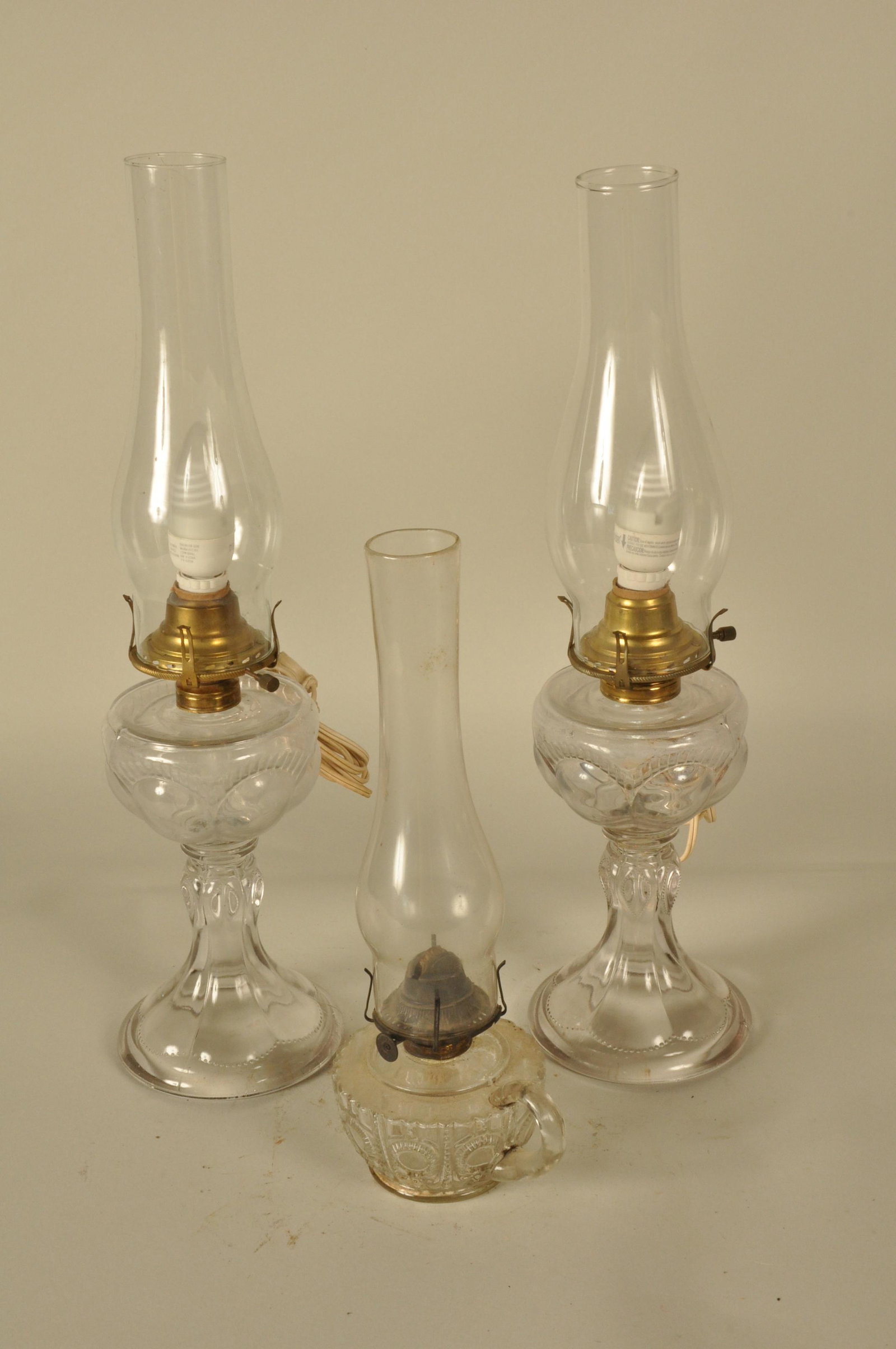 Lot of 3 Oil lamps: 3: Pair of bullseye, elec. burners, 19" H/ fingerloop 15" H orig. oil