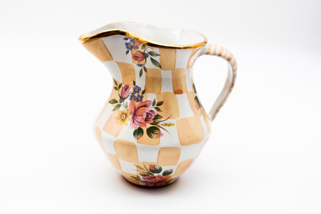 1995 MACKENZIE-CHILDS ORANGE MARMALADE CREAMER: CIRCA 1995 ORANGE MARMALADE CREAMER IN PRISTINE CONDITION.MacKenzie-Childs products much of which is from the original factory, most ceramics do come from the MacKenzie-Childs factory in Aurora, New Y