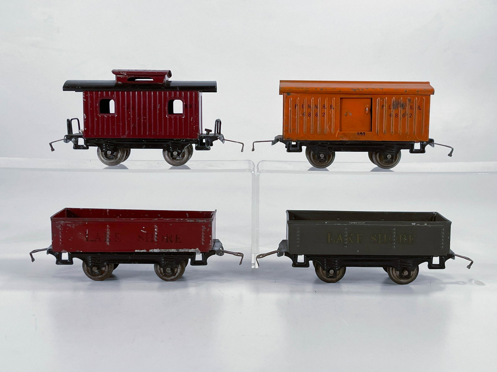 Lionel Prewar #800 Orange Boxcar, #801 Caboose and: Lionel Prewar #800 Orange Boxcar, #801 Caboose and Maroon Lake Shore Gondola and Gray Lake Shore Gondola, all in overall C6.