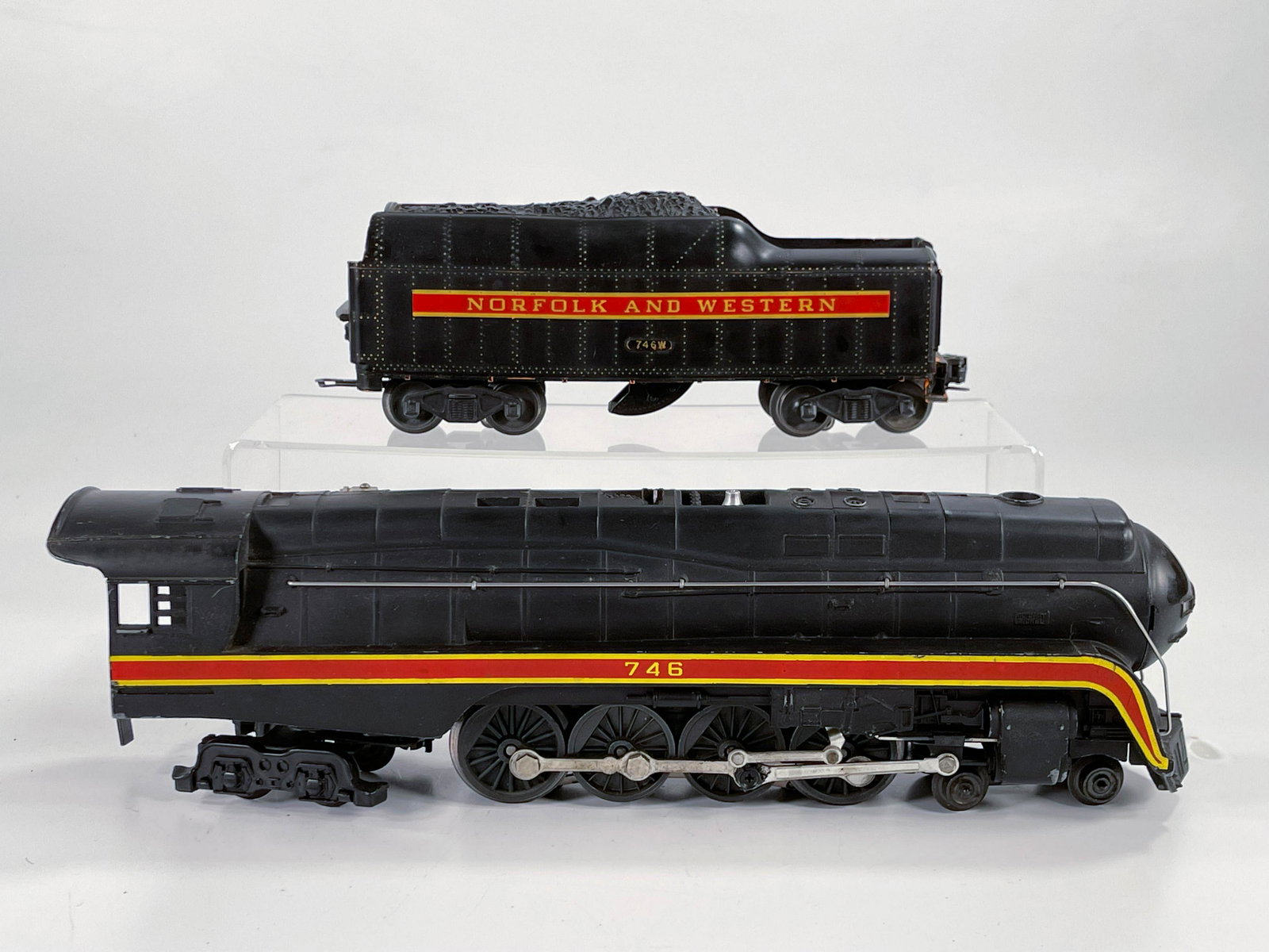 Lionel Postwar #746 and #746W Short Stripe Northfolk &: Lionel Postwar #746 and #746W Short Stripe Northfolk & Western Loco and Tender, with Loco in C7 based on small chips, and Tender in C7 based on small paint loss from tops of rivets (see pictures).
